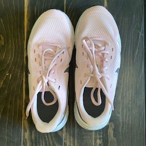 Nike light pink revolutions